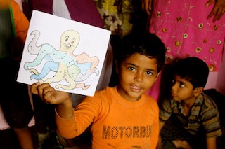 Jamie.Delhi.ChildrenWithClassDrawing.102212